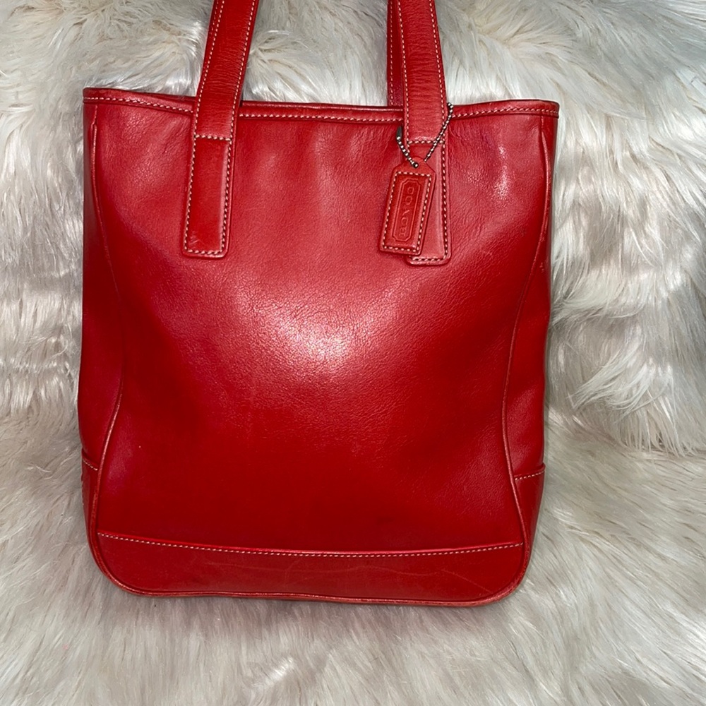 Coach lunch leather tote bag in red.